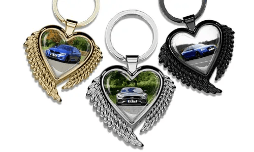Heart-shaped keychain with wings and a photo of your car