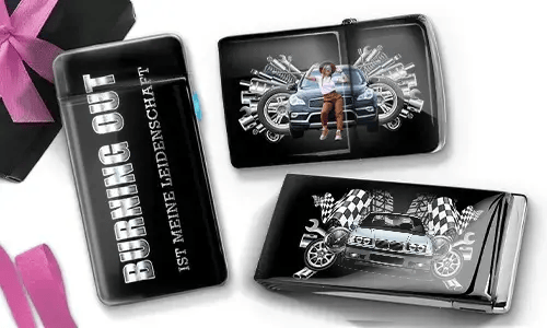 Three black wallets with car-themed designs. One has 