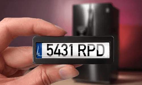 license plate magnet in hand
